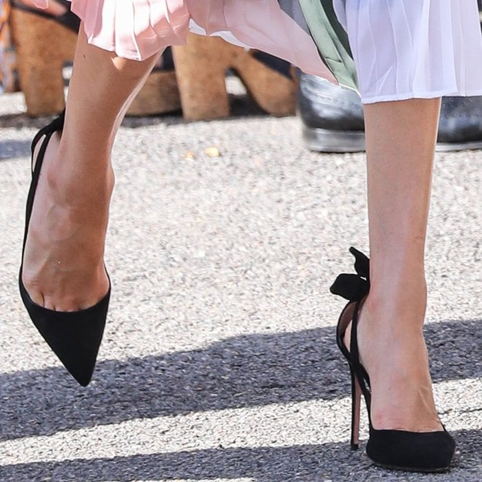 Duchess Meghan Markle shows toe cleavage in her go-to Aquazzura 'Deneuve' pumps