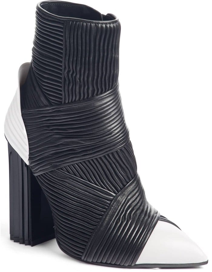A chunky, accordioned heel perfectly balances the style