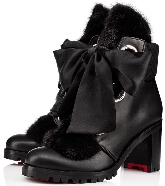 Bold design details—oversized grommets, a rib-knit counter and a stacked, lug heel—balance the silky bow and plush mink fur trim on a calfskin bootie with plenty of streetwise chic