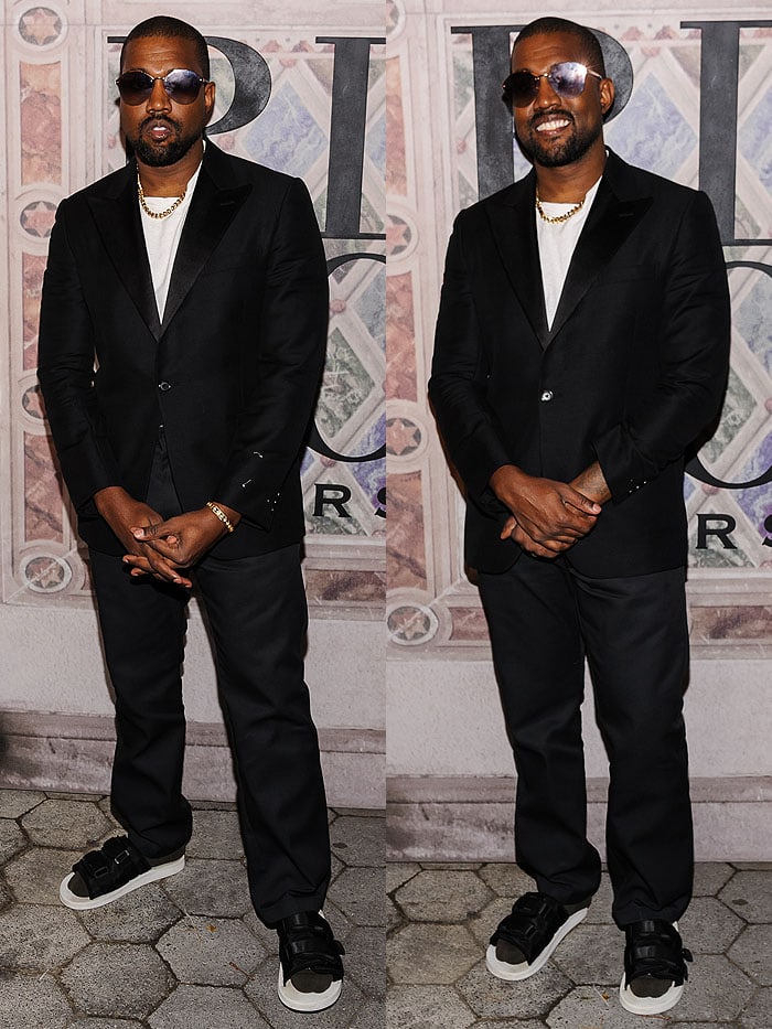 Kanye West wearing a suit with socks and sandals at the Ralph Lauren 50th Anniversary Event.