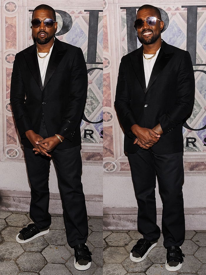 Kanye West wearing a suit with socks and sandals at the Ralph Lauren 50th Anniversary Event.
