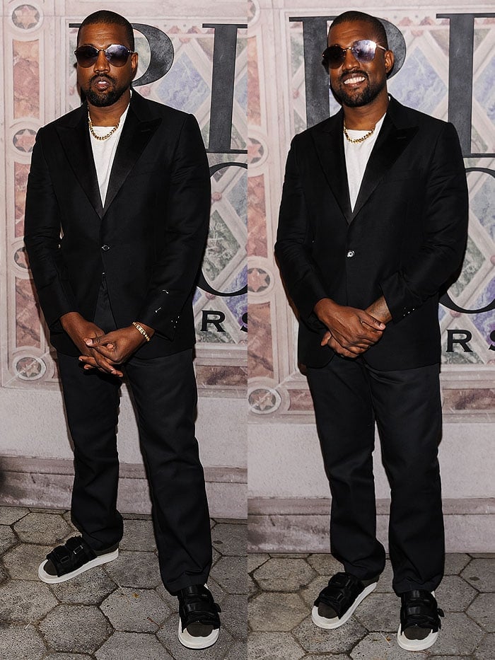 Kanye West wearing a suit with socks and sandals at the Ralph Lauren 50th Anniversary Event.