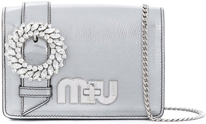 This chrome leather My Miu shoulder bag features a foldover top with magnetic closure, a main internal compartment, a chain link fastening and crystal accents