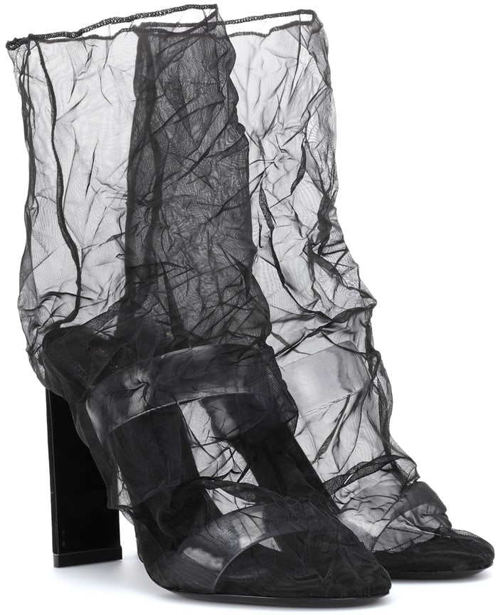 This directional silhouette has been crafted in Italy from sheer organza that has been steamed to create a louche crinkled effect