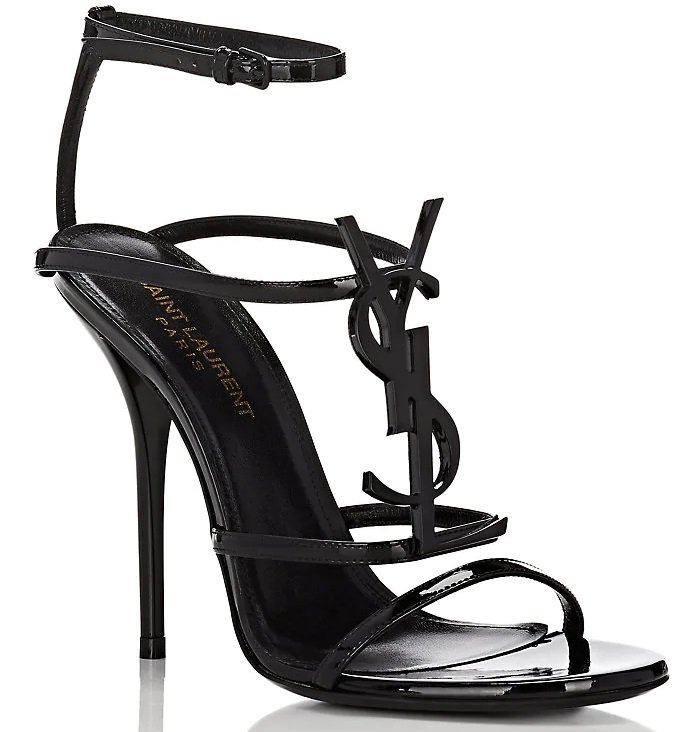 Saint Laurent's Cassandra sandals proudly display the label's YSL metallic monogram plaque