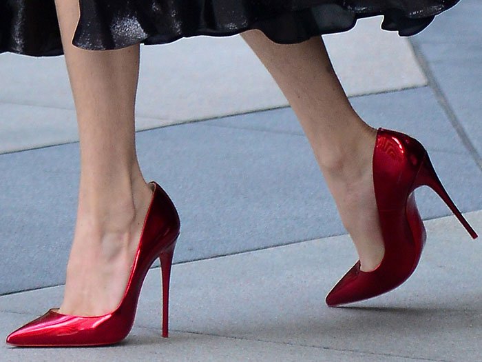 Metallic-red Christian Louboutin 'So Kate' pumps on Bella Thorne