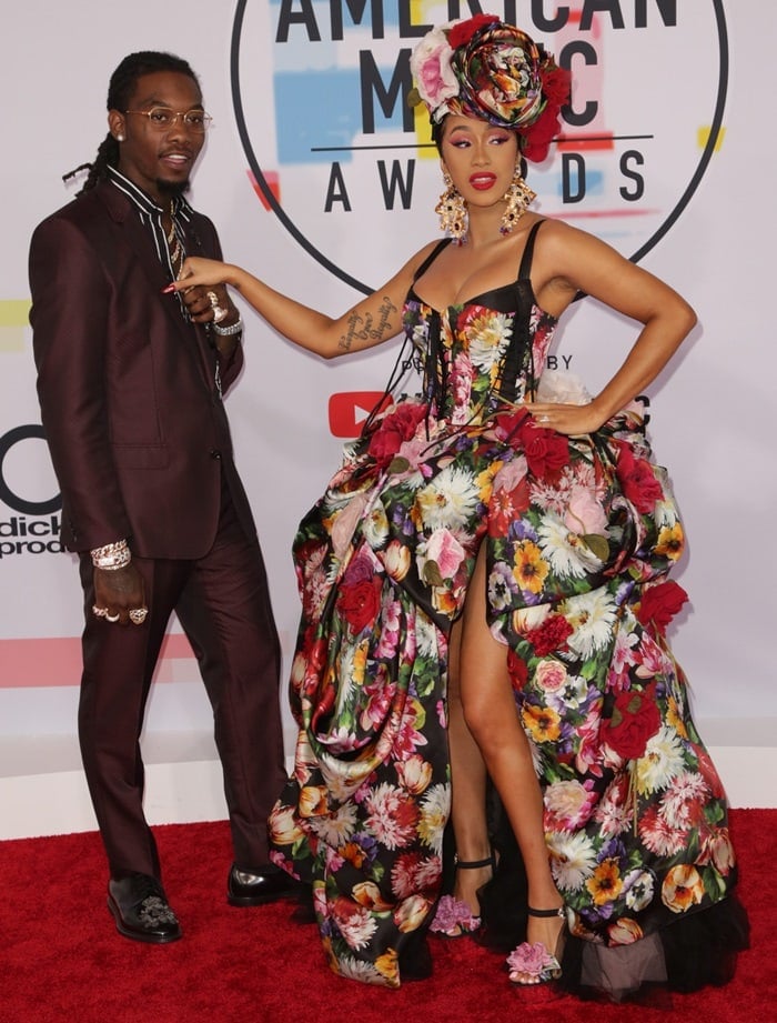 Cardi B posing with her husband Offset on the red carpet at the 2018 American Music Awards at the Microsoft Theater in Los Angeles on October 9, 2018