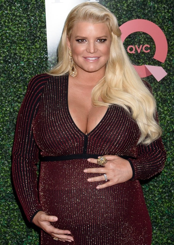 Jessica Simpson cradled her growing baby bump at the 25th Annual QVC FFANY Shoes on Sale Gala held at the Ziegfeld Ballroom in New York City on October 11, 2018