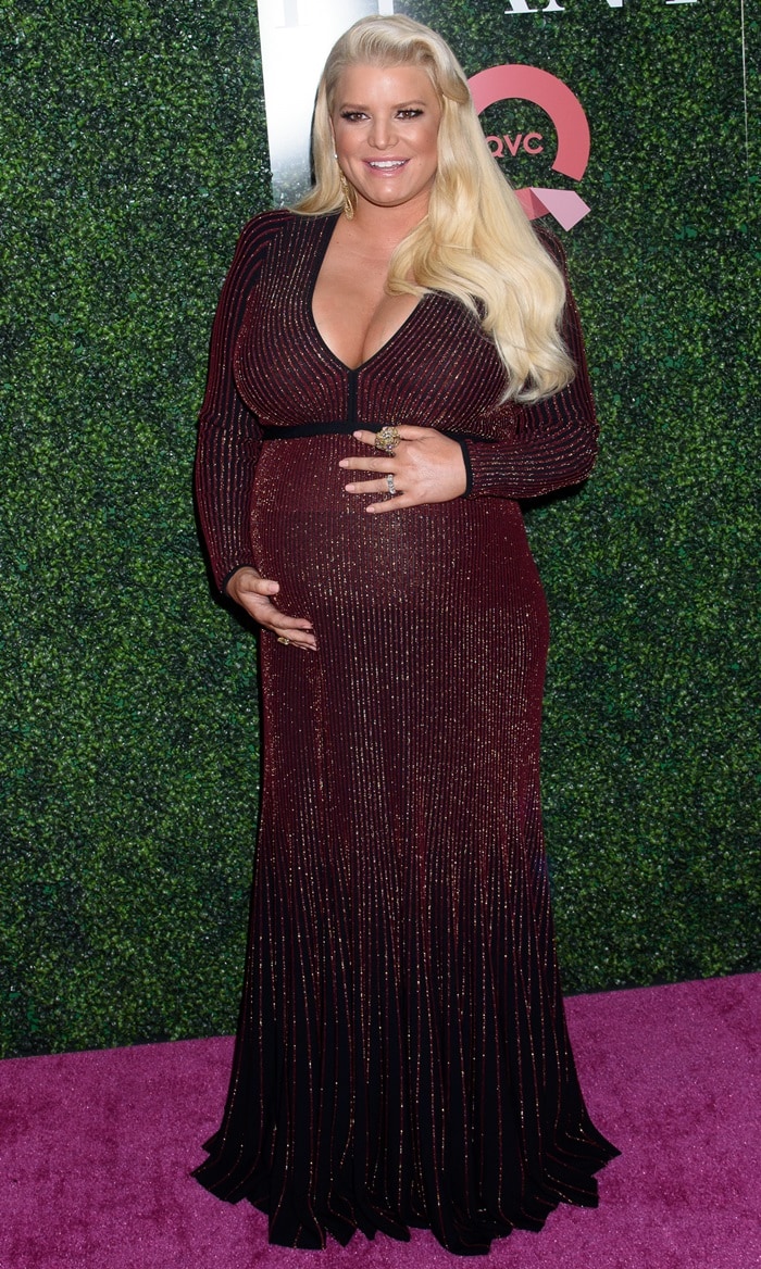 A very pregnant Jessica Simpson sparkled in a burgundy Elie Saab gown