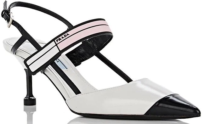 This classic style gets a sporty update through an elasticized vamp strap layered with black, white, and pink color-blocked rubber