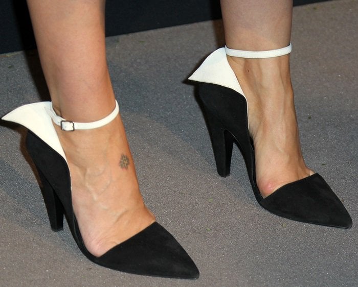 Sarah Paulson in black and white suede contrast ankle strap pumps