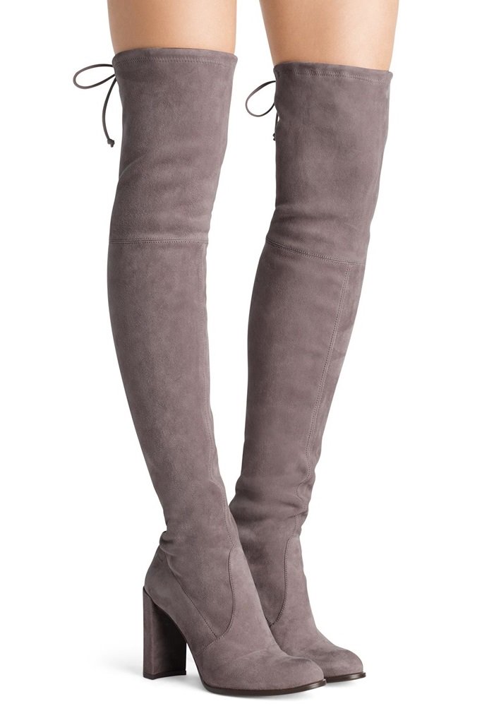 Over-the-knee boots are a fashion staple, and these tantalizing thigh-highs are elevated with a straight block heel and finished with Stuart Weitzman's signature tie back detail for a flawless fit