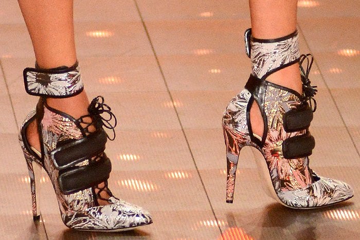 Stella Maxwell's endless legs in Brian Atwood floral-jacquard lace-up booties with velcro ankle cuffs