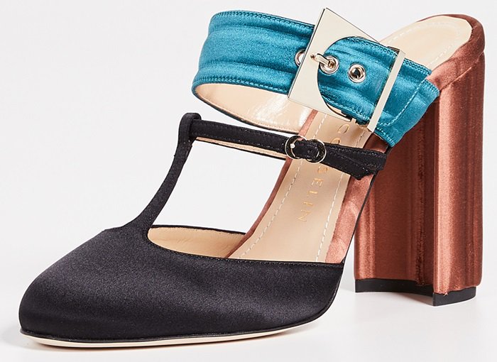 Teal, copper and black leather and silk crepe Olympe mules from Chloe Gosselin featuring an almond toe, a T-strap to the front, a side buckle fastening, a branded insole, a backless design, a branded insole and a high block heel.