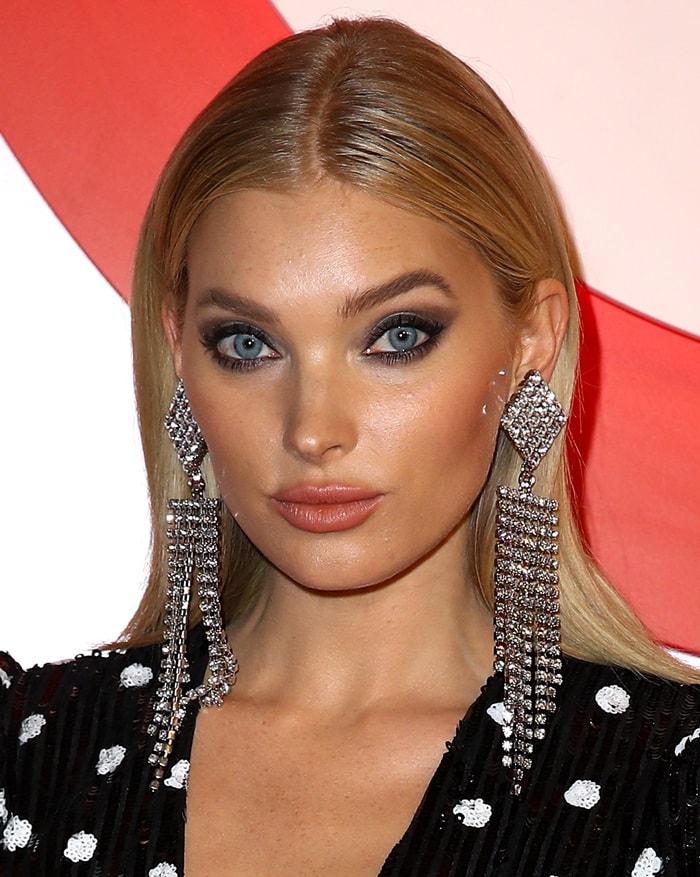 Elsa Hosk's drop earrings by Alessandra Rich featuring Swarovski crystal pendants