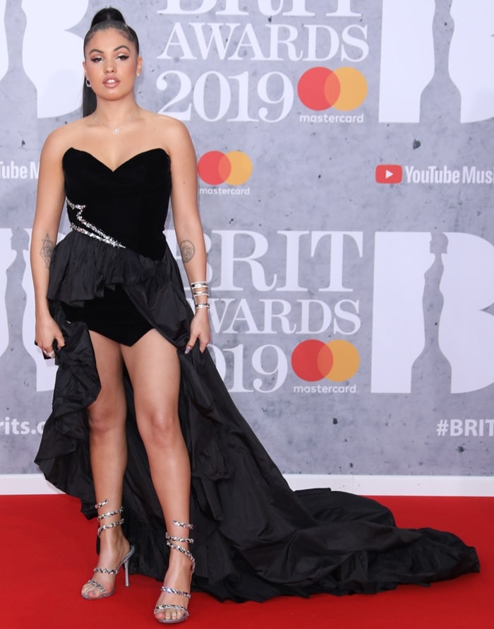 Mabel McVey flashed her sexy legs at the 2019 BRIT Awards