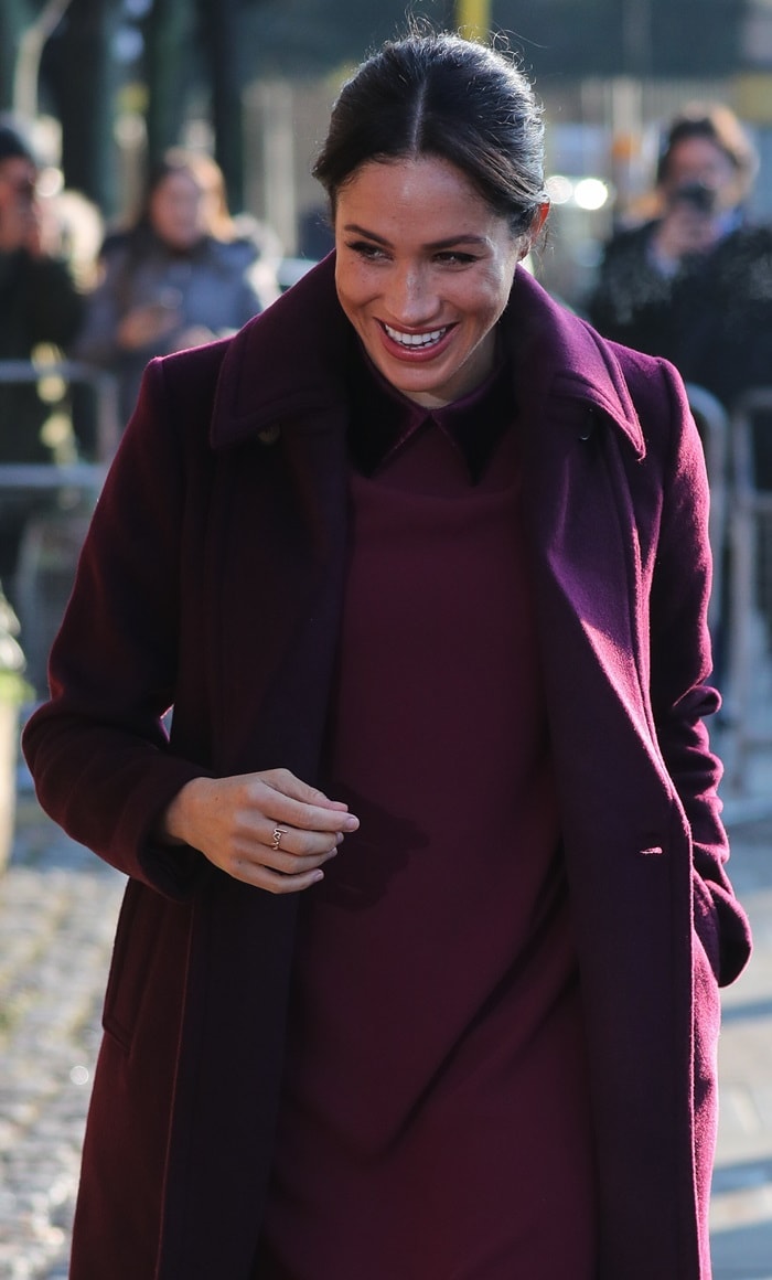 Meghan Markle's burgundy wool, double-breasted Daylina coat from Club Monaco