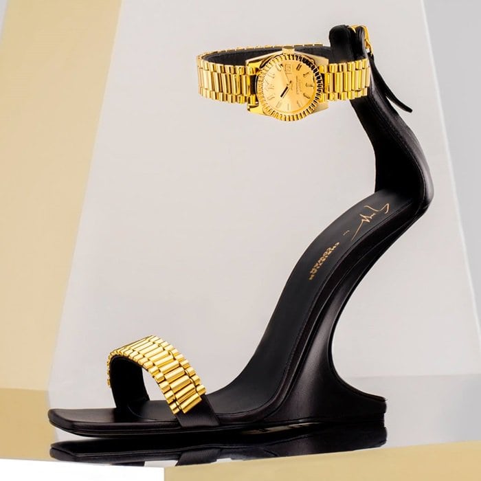 This sleek sandal combines the distinct visions of two masterful designers into one covetable style