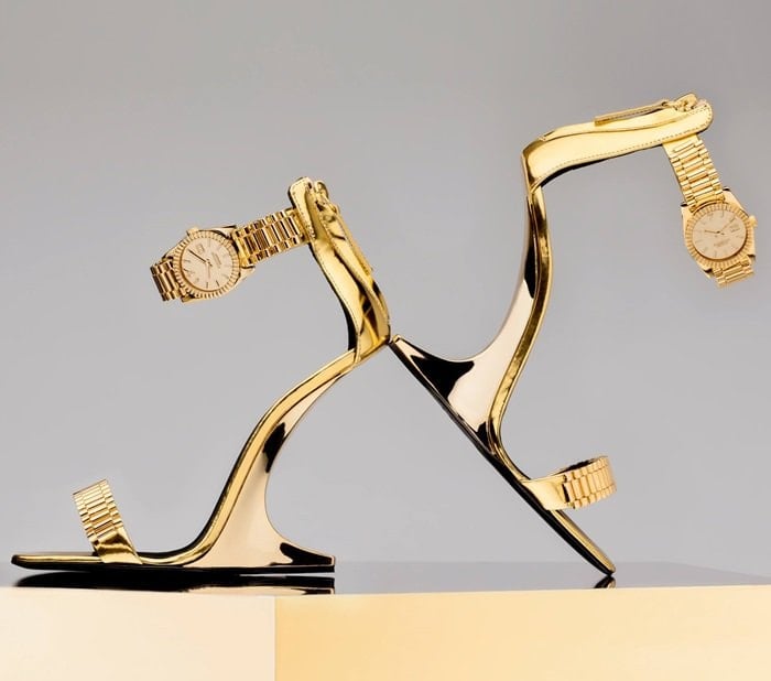 A sensual illusion heel and unexpected wristwatch buckles define this see now-buy now style