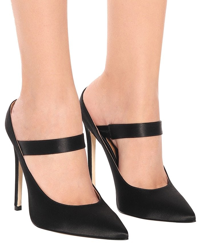 This elegant style has been crafted in Italy from lustrous black satin with a pointed toe, strap across the vamp, and low heel counter