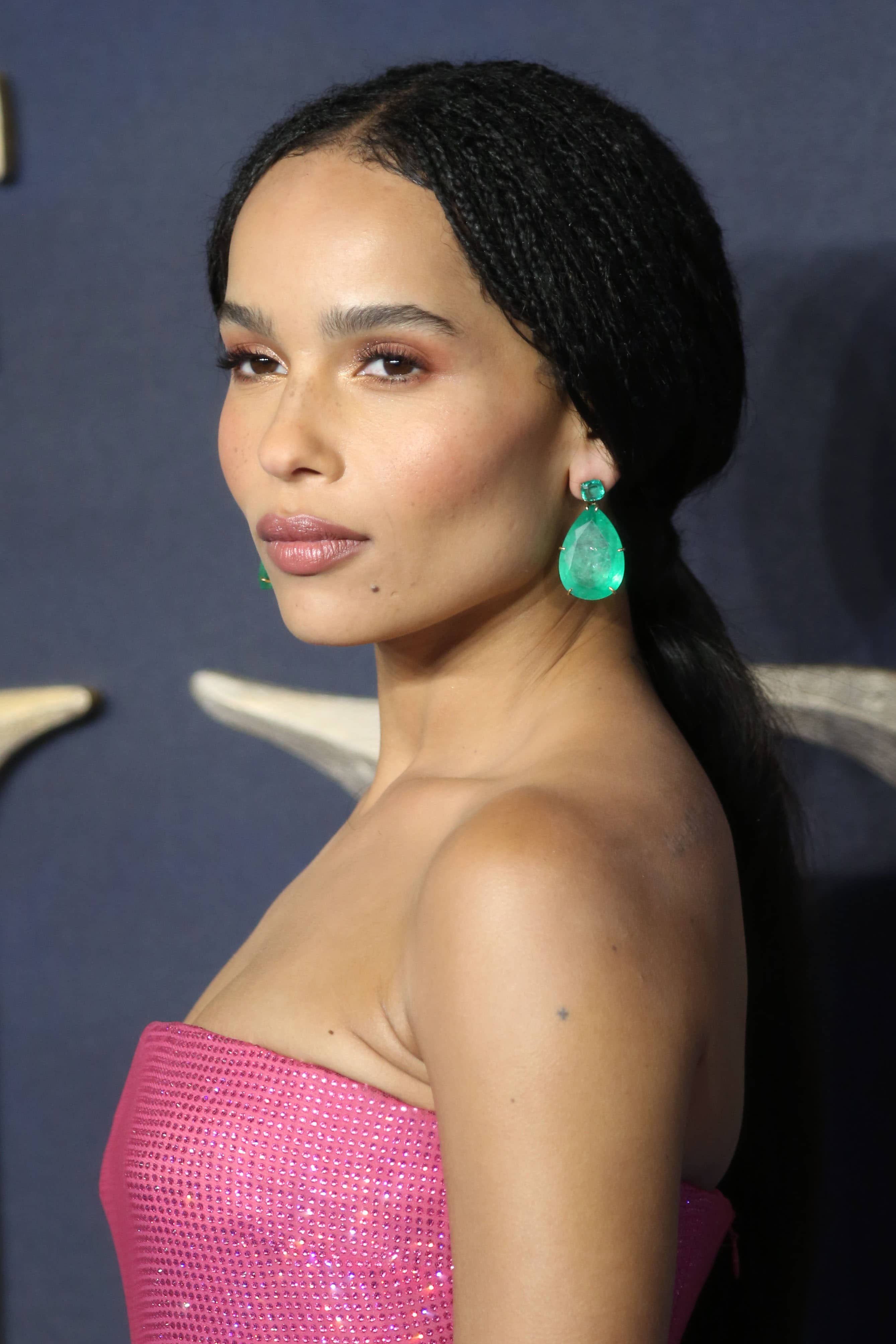 Zoe Kravitz wearing exquisite emerald drop earrings at the "Fantastic Beasts: The Crimes Of Grindelwald" UK premiere held at Cineworld Leicester Square in London, England, on November 13, 2018
