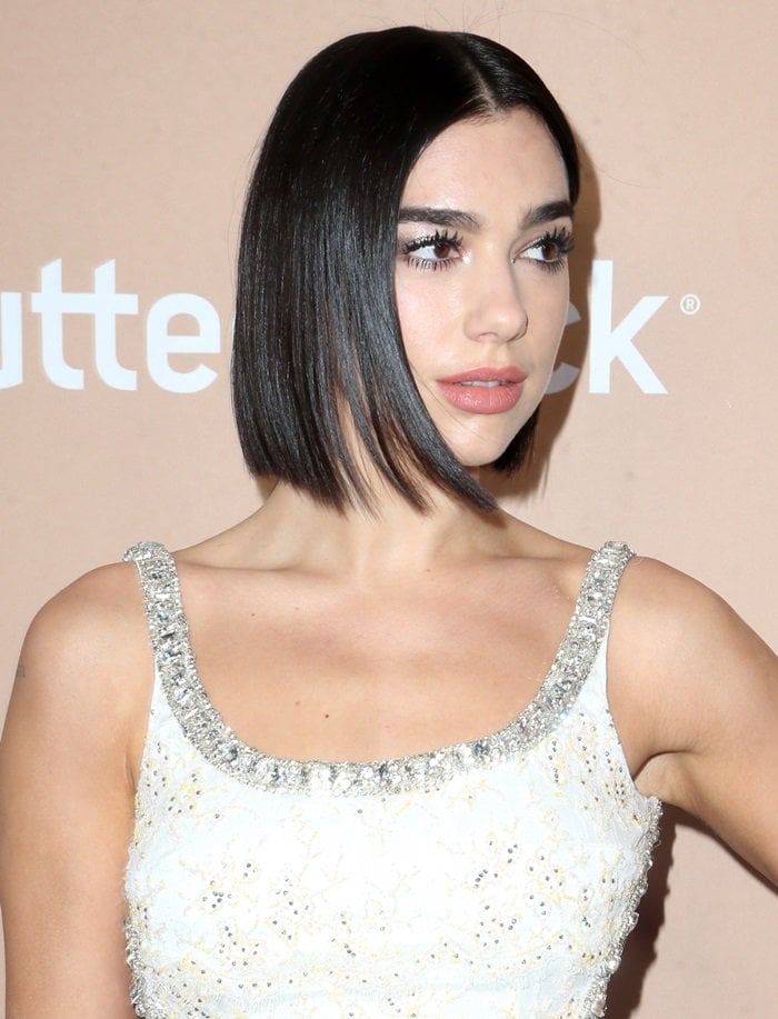 Dua Lipa styled her raven tresses into a sleek straight style and rocked smokey makeup around her light brown eyes