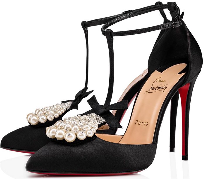 These pumps are crafted in Italy with a high stiletto heel and a crystal and pearl floral motif set into to the point tie, then finished with the label's signature lacquered sole