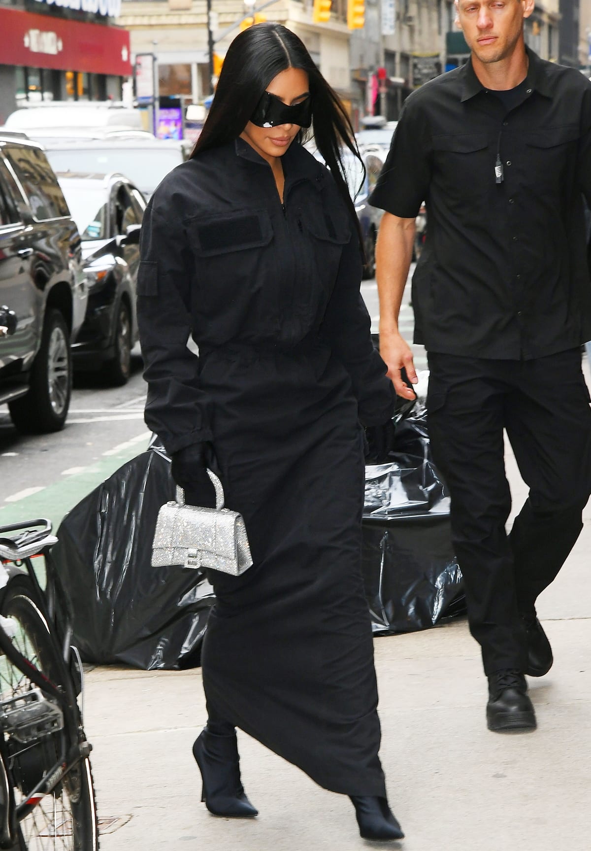 Kim Kardashian wears a black twill Balenciaga gown inspired by a futuristic gaming world
