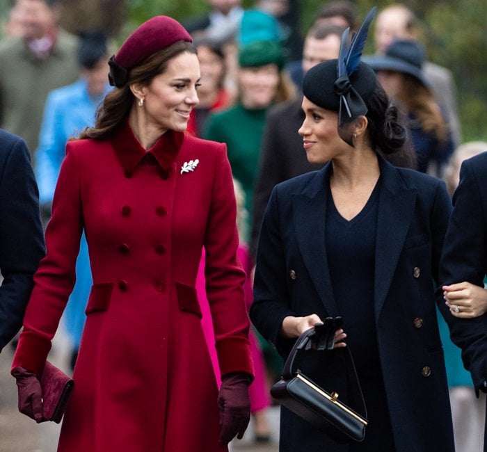 Meghan Markle and sister-in-law Kate Middleton arrive together at Christmas Day Church Service at Church of St. Mary Magdalene on the Sandringham estate in King’s Lynn, England, on December 25, 2018