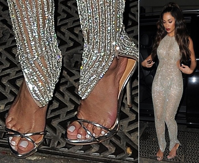 Nicole Scherzinger's feet show visible redness and swelling, likely caused by tight, strappy high heels