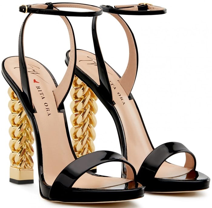 Crafted from luxurious black patent leather, these sandals are set on the iconic Chain chrome heel and fasten with a thin ankle strap and have a leather logo-adorned sole, the perfect intersection of Giuseppe Zanotti