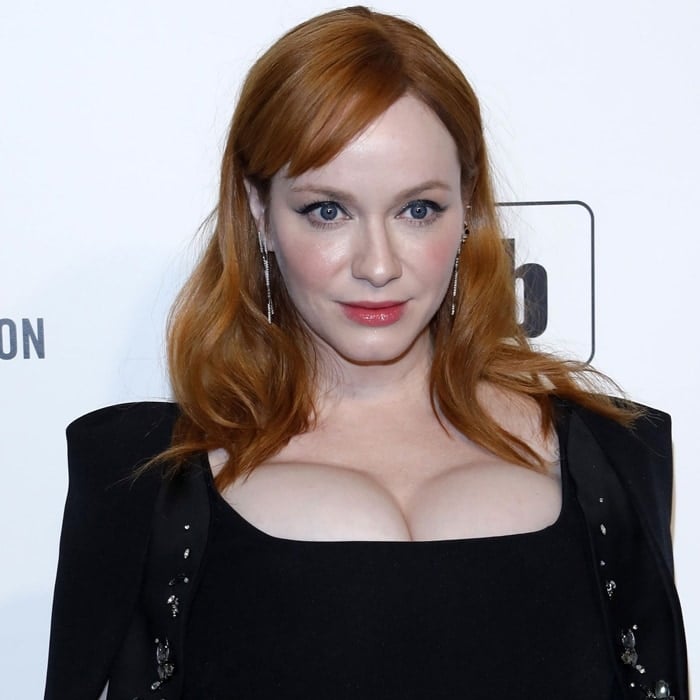 Christina Hendricks says anyone who touches her boobs will realize they are real