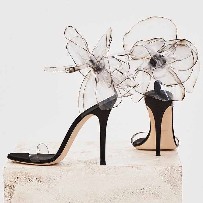 These couture sandals are made from transparent vinyl with inserts in black satin and suede