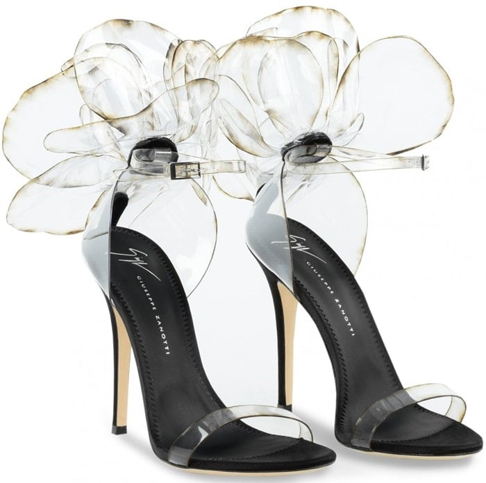 These couture sandals are made from transparent vinyl with inserts in black satin and suede