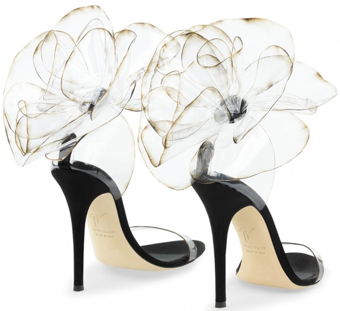 These couture sandals are made from transparent vinyl with inserts in black satin and suede