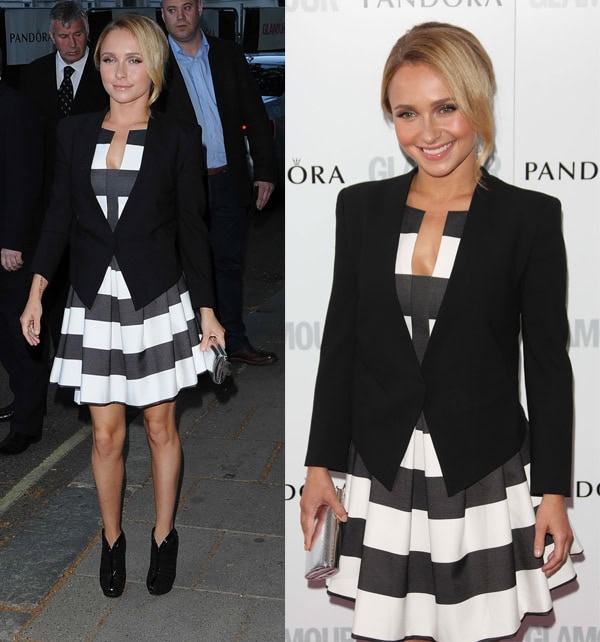 Hayden Panettiere styles a black blazer over a bold black-and-white striped fit-and-flare dress, pairing the look with sleek black platform booties that add a modern edge to her feminine silhouette