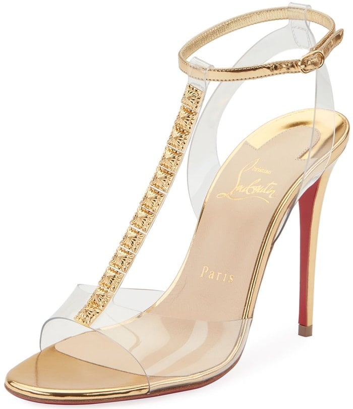 On-trend PVC sandals with high-shine leather accents adorned with faceted metallic T-strap trim.