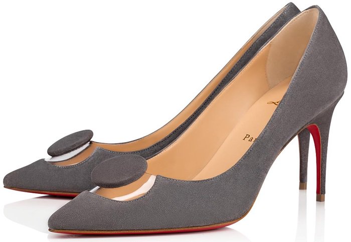 Timeless, the Moon pump is a vintage inspiration. Made in shadow-gray suede, it has a discreet transparent PVC piece on the vamp, revealing a circle with a sixties look.