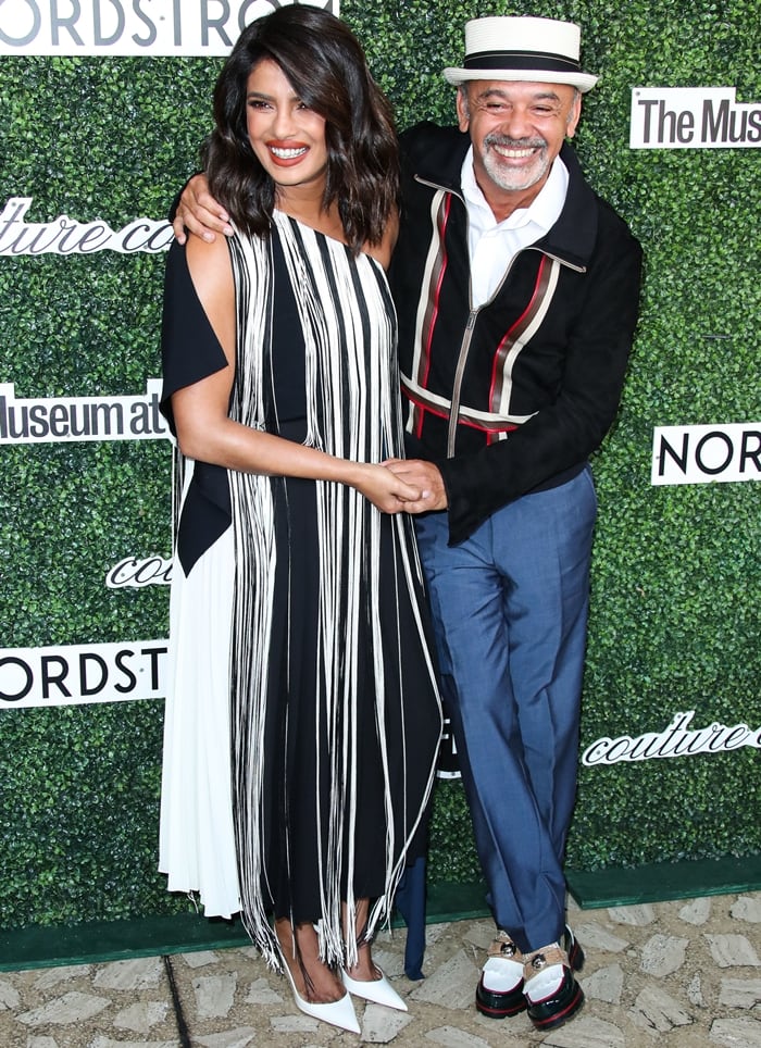 Actress Priyanka Chopra Jonas and French fashion designer Christian Louboutin attending the 2019 Couture Council Award Luncheon