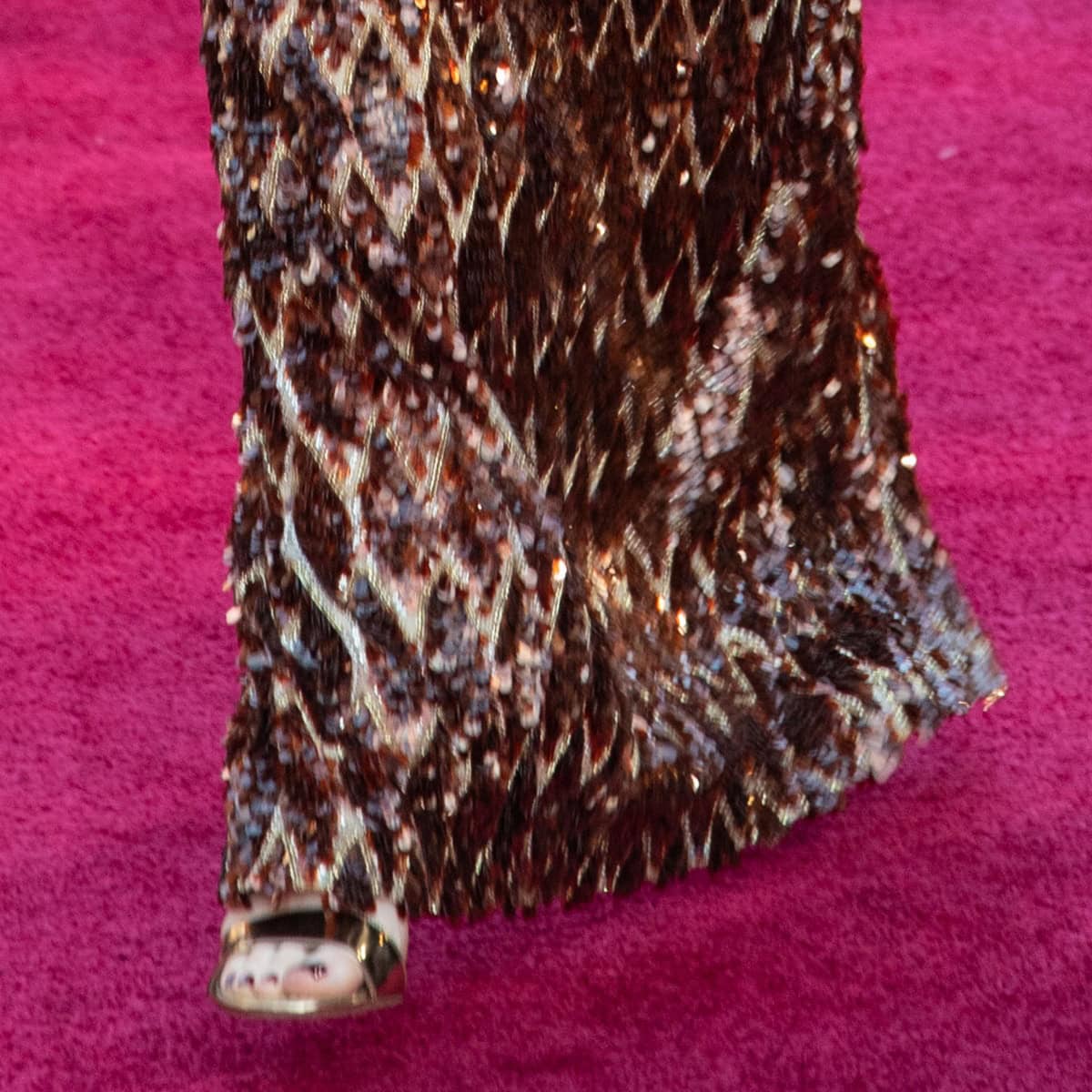 A rare glimpse of Emma Stone’s custom Louis Vuitton sandals peeking out from beneath her heavily embroidered gown at the 2019 Oscars