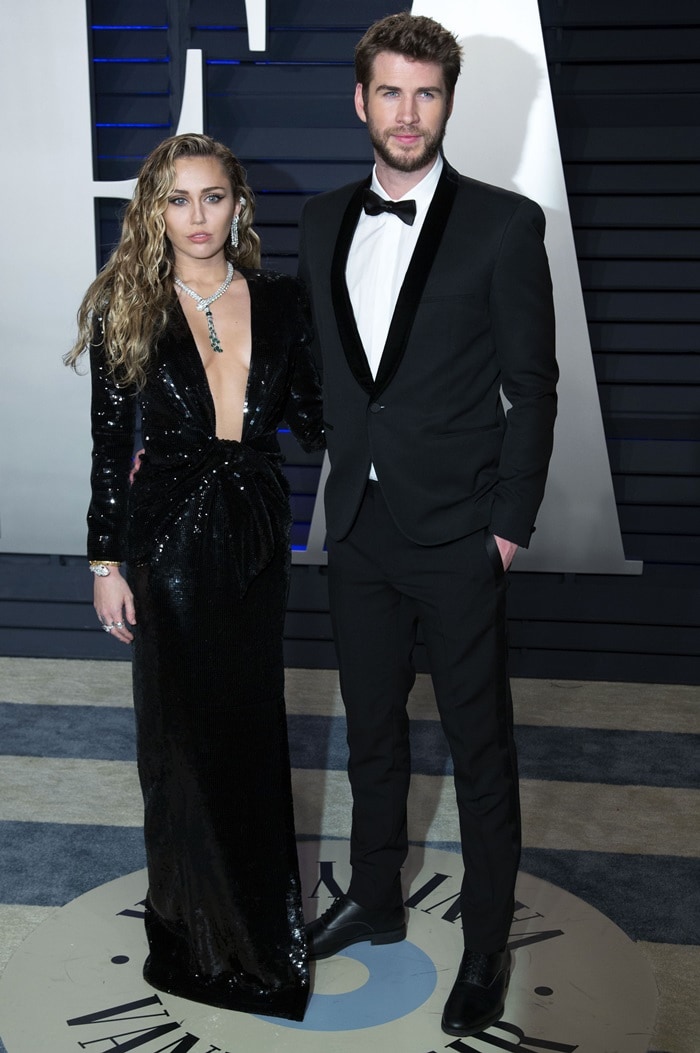 Miley Cyrus cozied up to husband Liam Hemsworth at the 2019 Vanity Fair Oscar Party at the Wallis Annenberg Center for the Performing Arts in Beverly Hills, California, on February 24, 2019