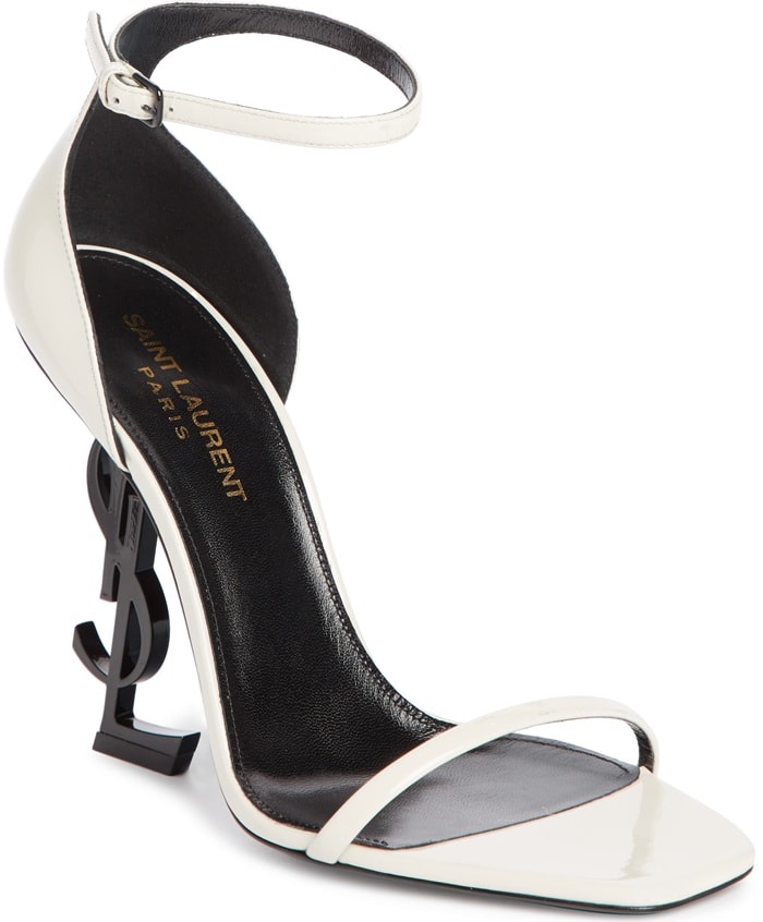 Balanced on an interlocking YSL logo heel, this striking ankle-strap pump makes a signature statement with every step