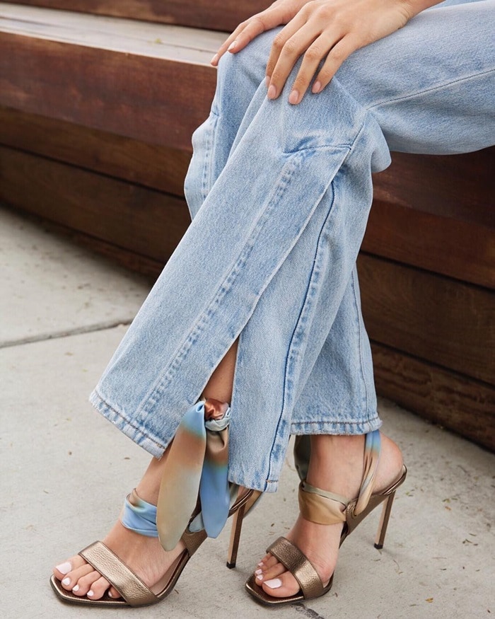 Sky-high nonstretch-denim jeans and scarf-embellished shoes