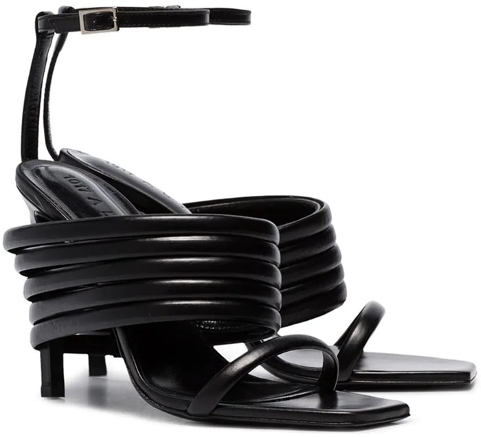 Crafted from leather, these black Tunnel 100 strappy sandals feature an ankle strap with a side buckle fastening, an open toe, a high stiletto heel with wrap-around straps and a leather sole