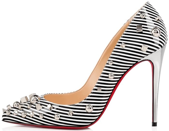 Glossy stripes are enhanced with silvertone studs of varying shapes and sizes on these patent leather pumps