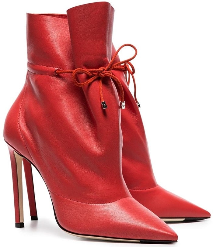 These red ankle boots rework the classic silhouette with a drawstring toggle for a slouchy effect