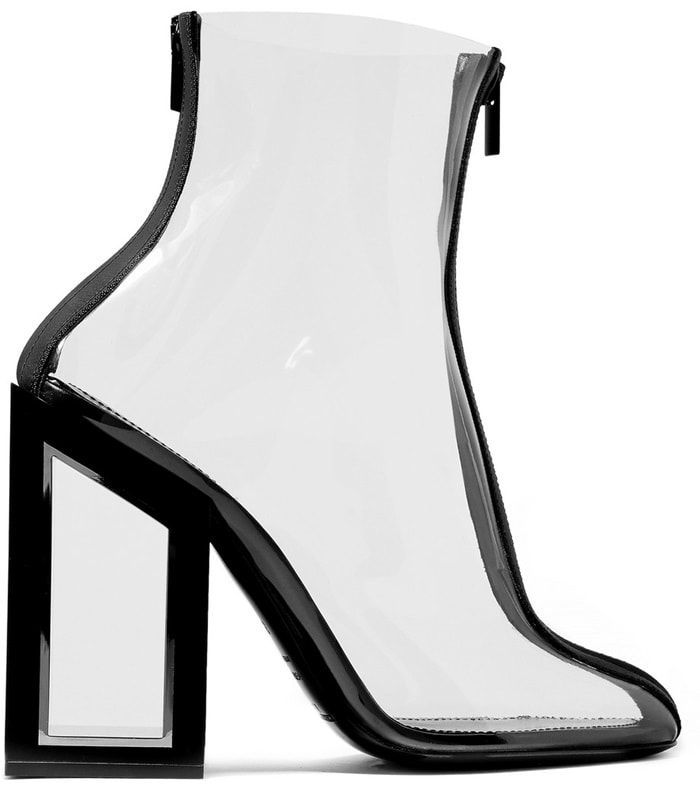 On-trend clear PVC ankle boots featuring a bold cutout block heel for an eye-catching look