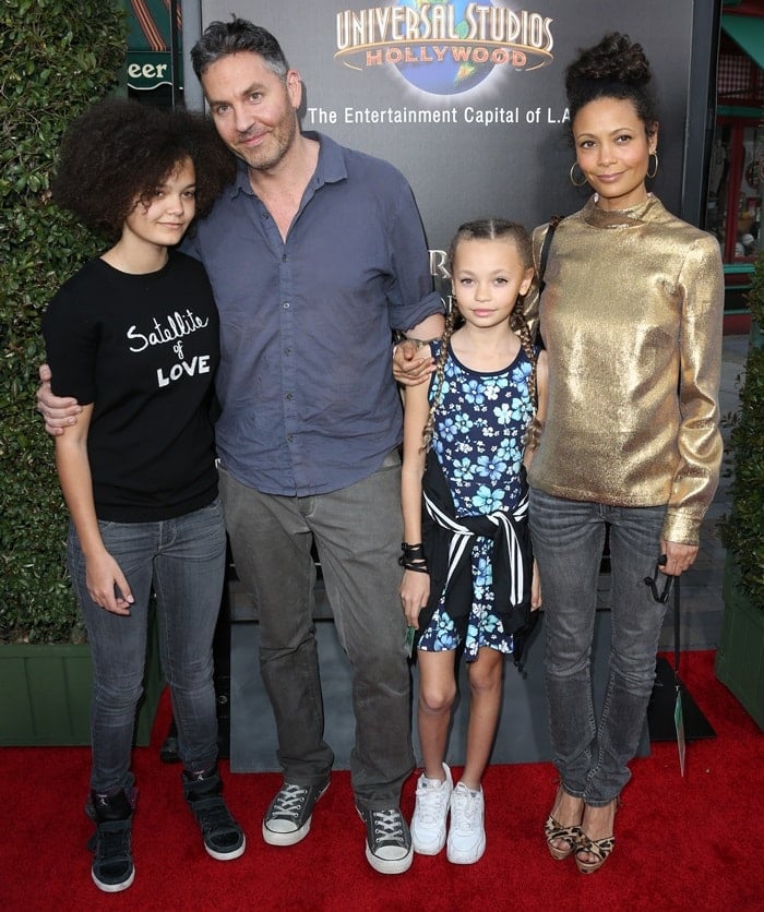 Thandiwe Newton posed with her husband Ol Parker and their daughters Ripley, 15, and Nico, 11, while attending the Wizarding World of Harry Potter Opening held at Universal Studios Hollywood in Universal City, California, on April 5, 2013