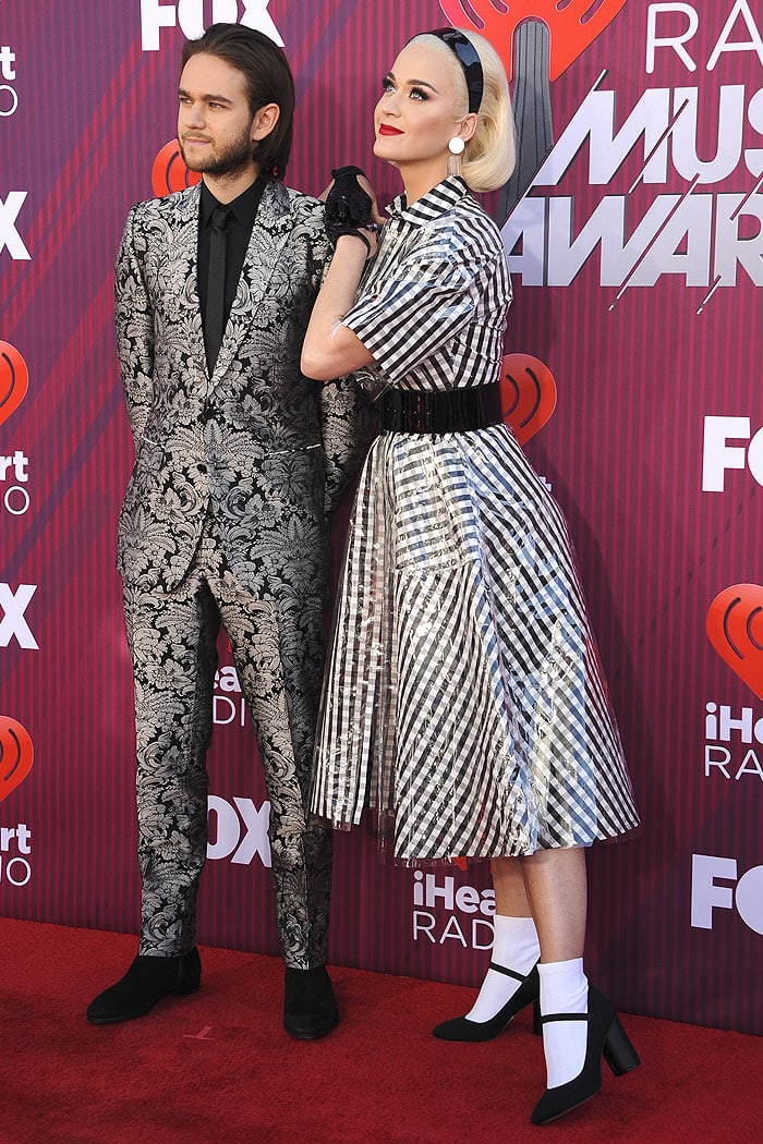 Katy Perry walking the red carpet with Zedd at the 2019 iHeartRadio Music Awards at the Microsoft Theater in Los Angeles, California, on March 14, 2019