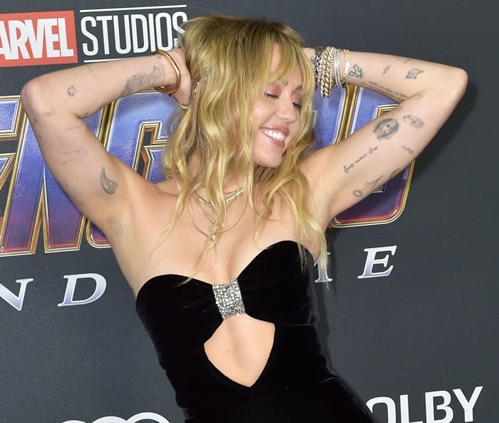 Miley Cyrus showed off her inked arms and jewelry